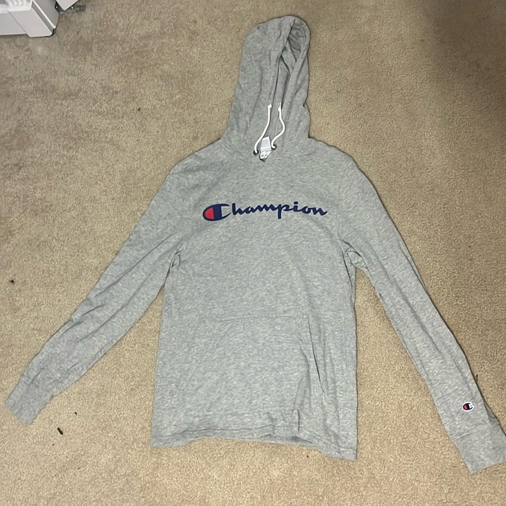 $15- Small Light Gray Champion Brand hoodie with the Champion logo